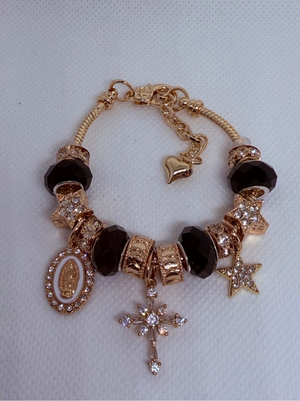 Cross Gold-Tone Charm Bracelet with Black Faceted Beads and Crystal Accents